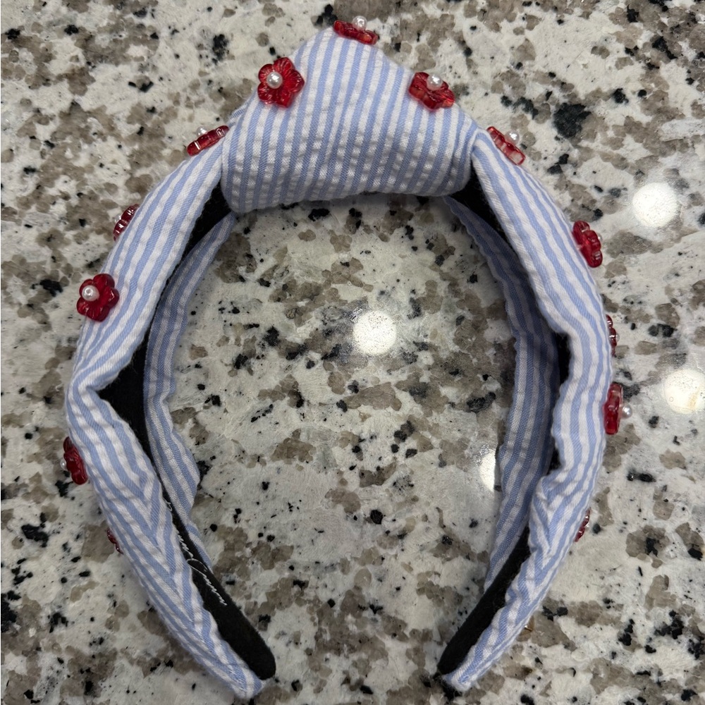 Blue and White Striped Hair Accessory with Red Accents